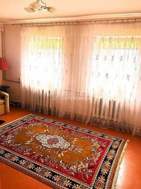 Люботин, центр міста, 24 сотки, два будинки на ділянці, гараж, сад.