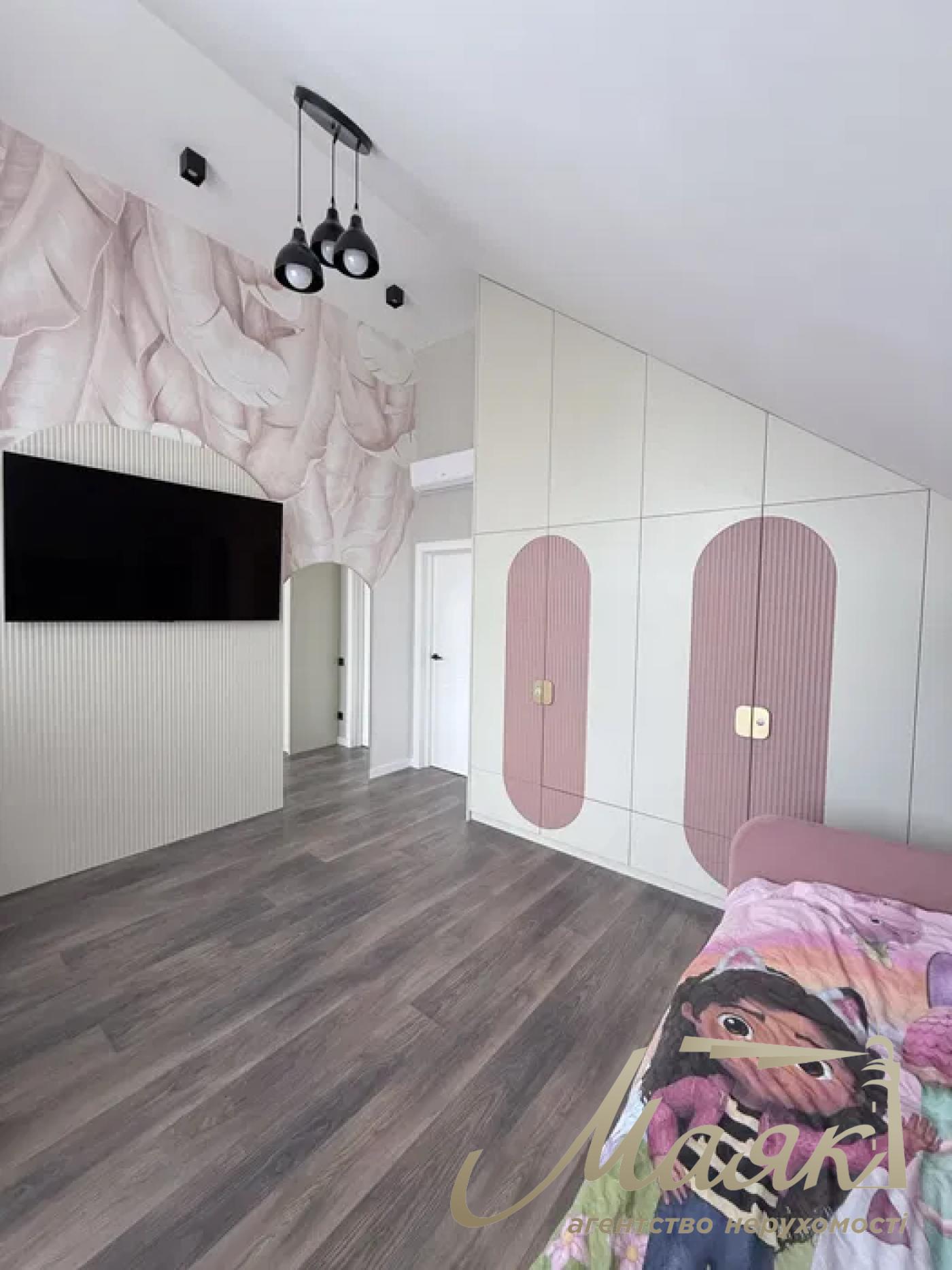 A stylish two-story house is for sale in a cozy wooded area in the village of Khodosivka—the perfect place for those who appreciate peace and quiet, nature, and the comforts of modern life.