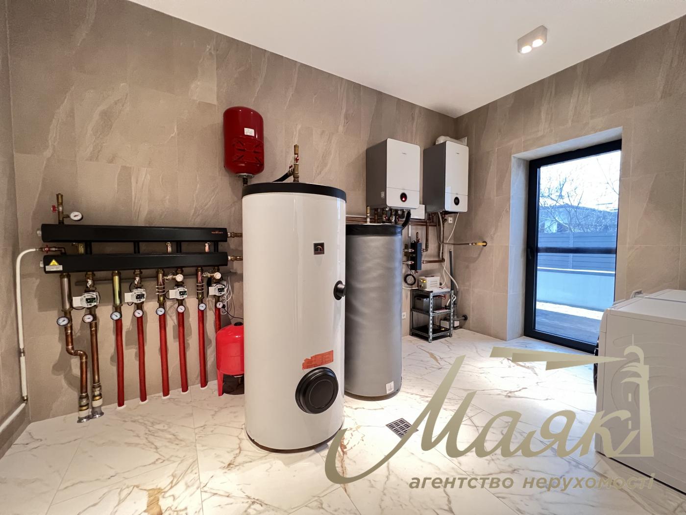 Оренда заміського будинку на Осокорках у котеджному містечку "Блакитна Лагуна"