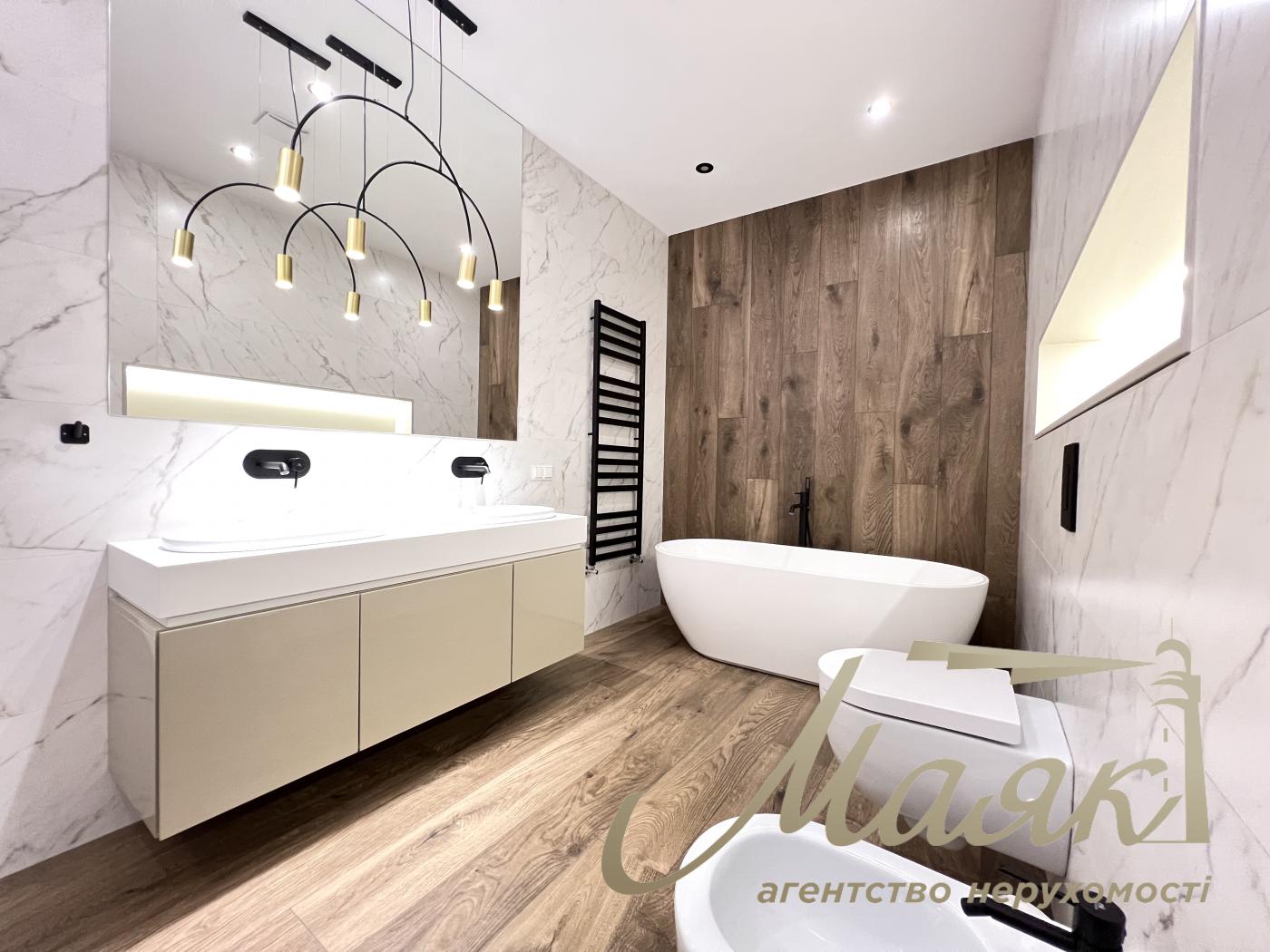 Оренда заміського будинку на Осокорках у котеджному містечку "Блакитна Лагуна"