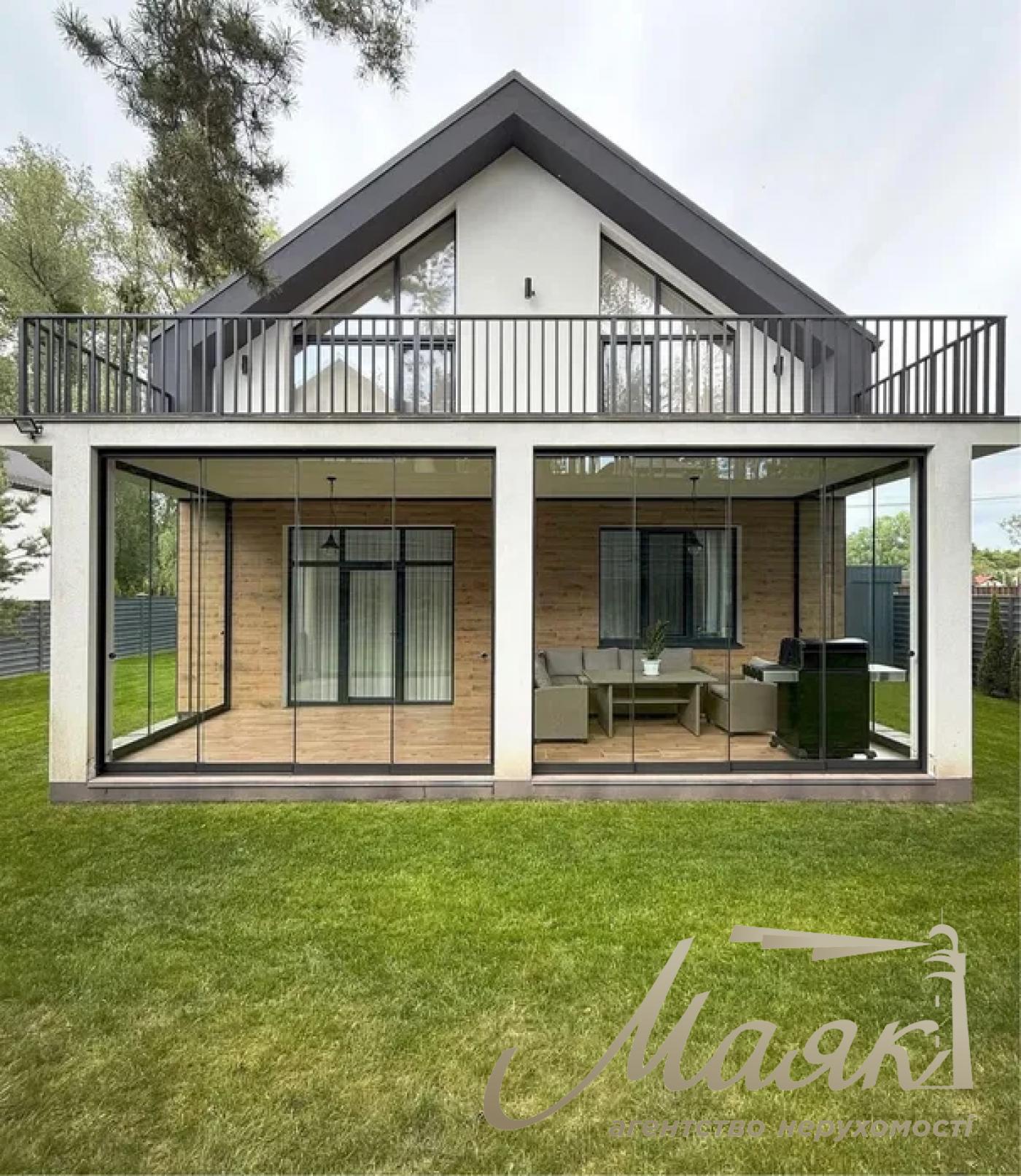 A stylish two-story house is for sale in a cozy wooded area in the village of Khodosivka—the perfect place for those who appreciate peace and quiet, nature, and the comforts of modern life.