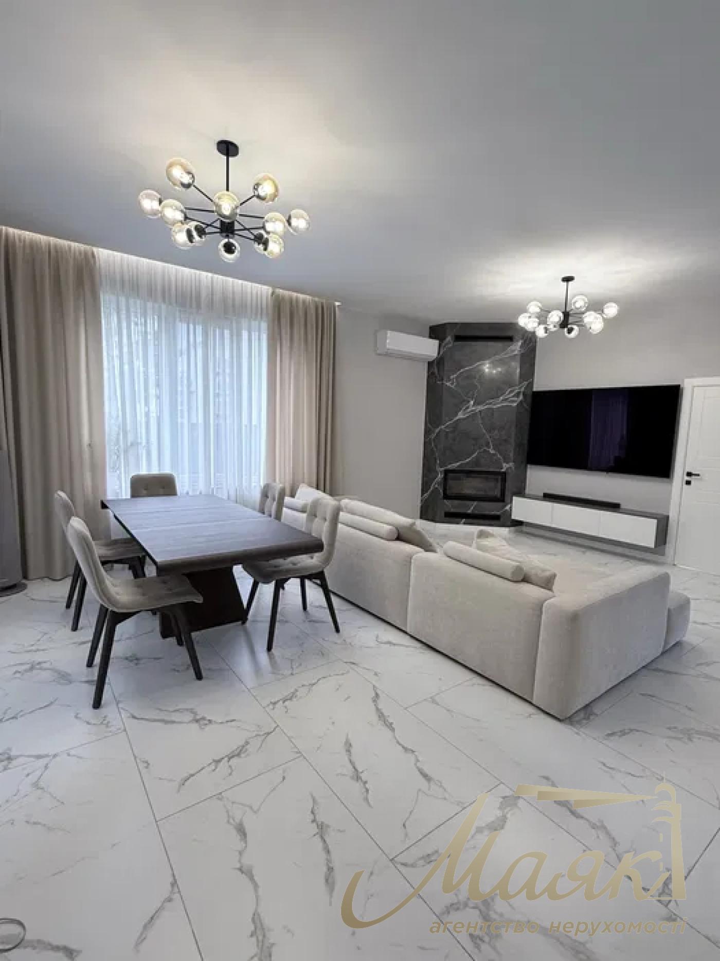 A stylish two-story house is for sale in a cozy wooded area in the village of Khodosivka—the perfect place for those who appreciate peace and quiet, nature, and the comforts of modern life.