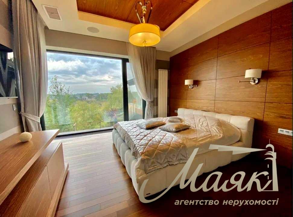 Оренда будинку площею 370 м² у закритому котеджному містечку «Лісники» — авторський дизайн, 15 соток та гараж на 2 автомобілі, вул. Гайова