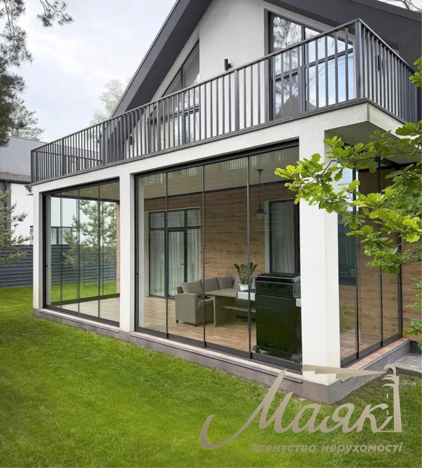 A stylish two-story house is for sale in a cozy wooded area in the village of Khodosivka—the perfect place for those who appreciate peace and quiet, nature, and the comforts of modern life.