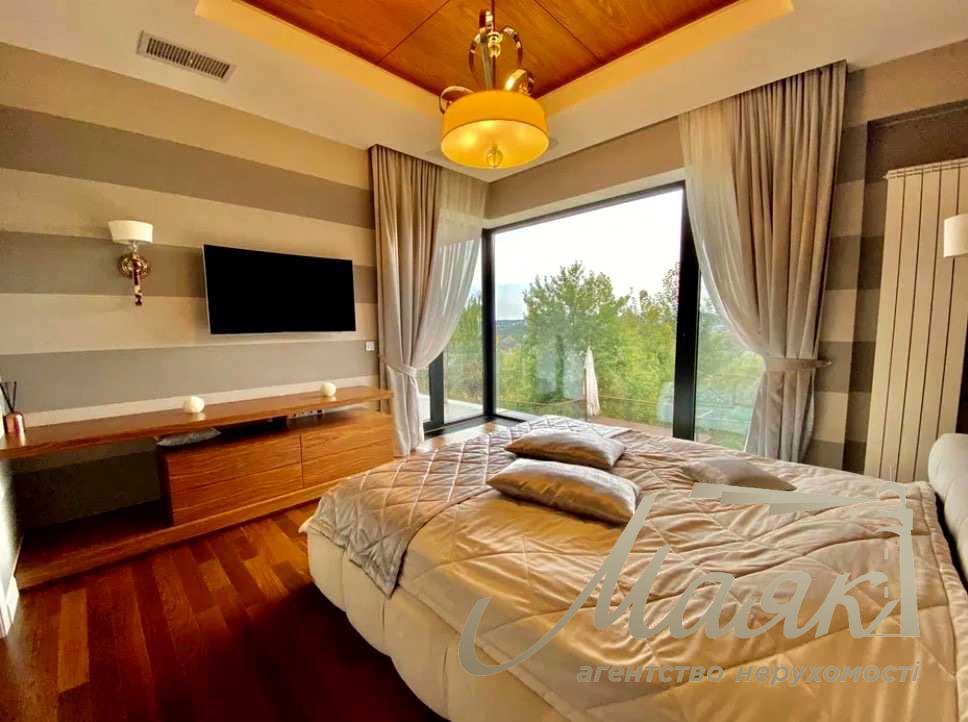 Оренда будинку площею 370 м² у закритому котеджному містечку «Лісники» — авторський дизайн, 15 соток та гараж на 2 автомобілі, вул. Гайова