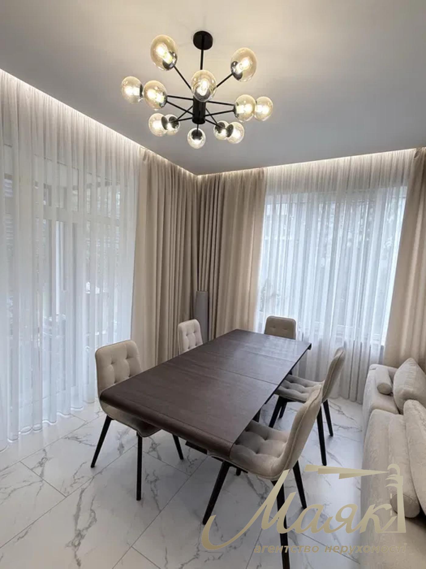 A stylish two-story house is for sale in a cozy wooded area in the village of Khodosivka—the perfect place for those who appreciate peace and quiet, nature, and the comforts of modern life.