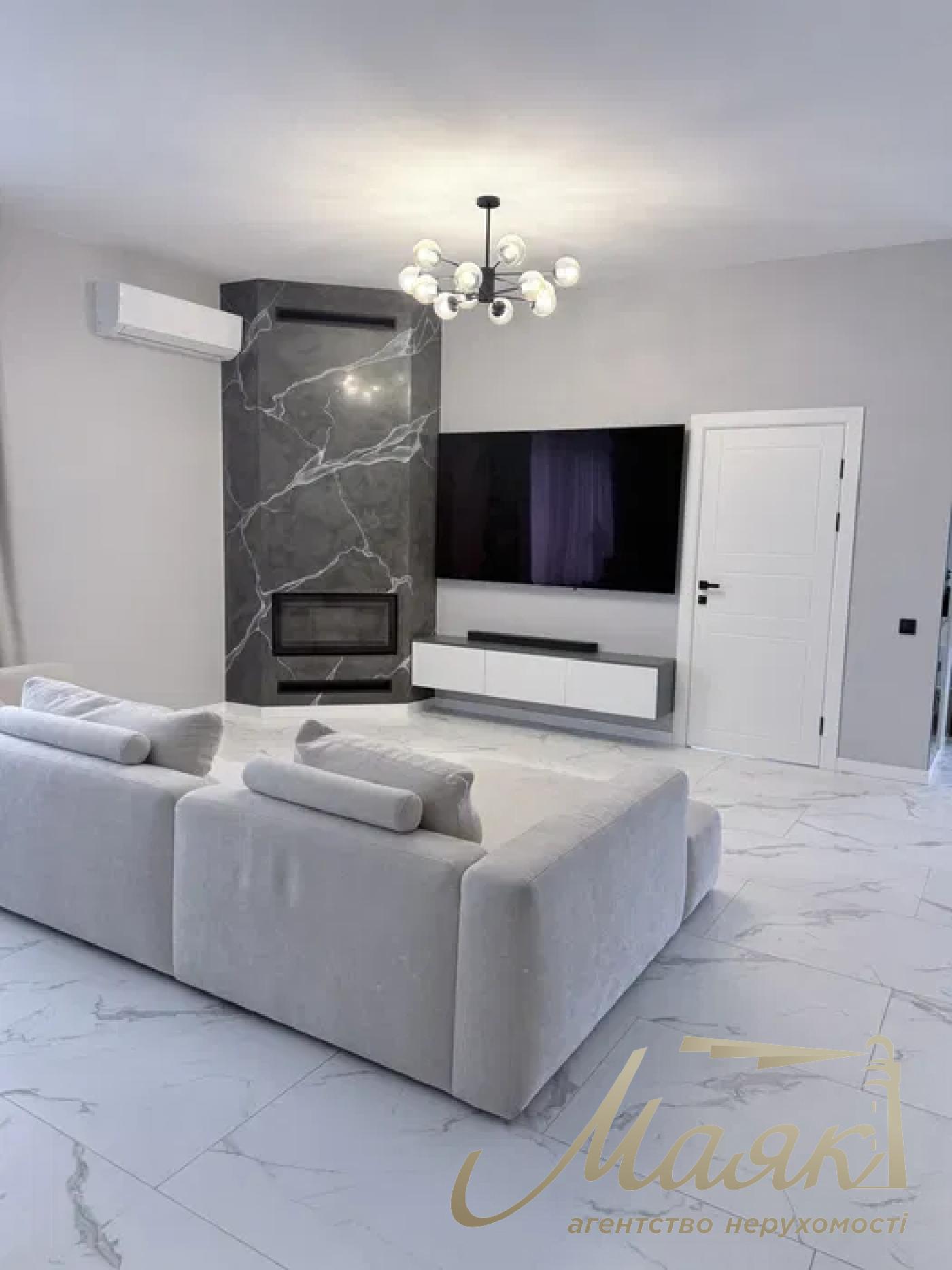 A stylish two-story house is for sale in a cozy wooded area in the village of Khodosivka—the perfect place for those who appreciate peace and quiet, nature, and the comforts of modern life.